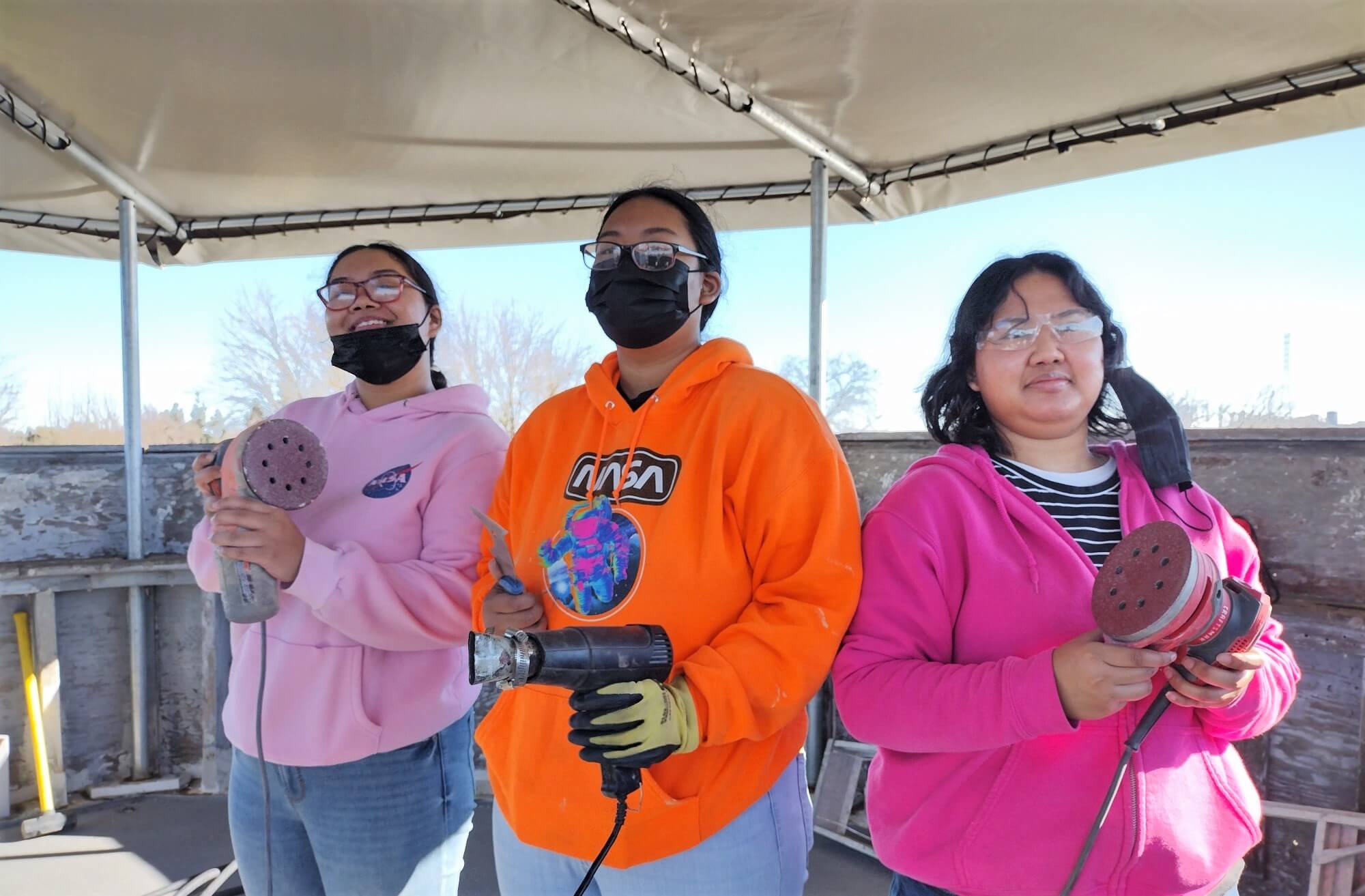 Volunteers posing together during a Stockton Maritime Museum volunteer workday.