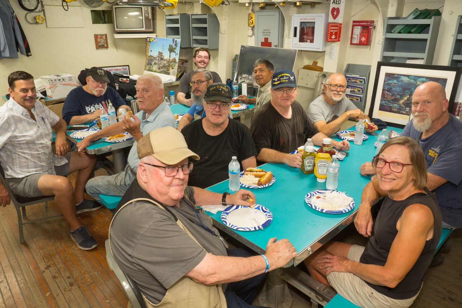 Volunteers gathered around a table during a Stockton Maritime Museum volunteer lunch.